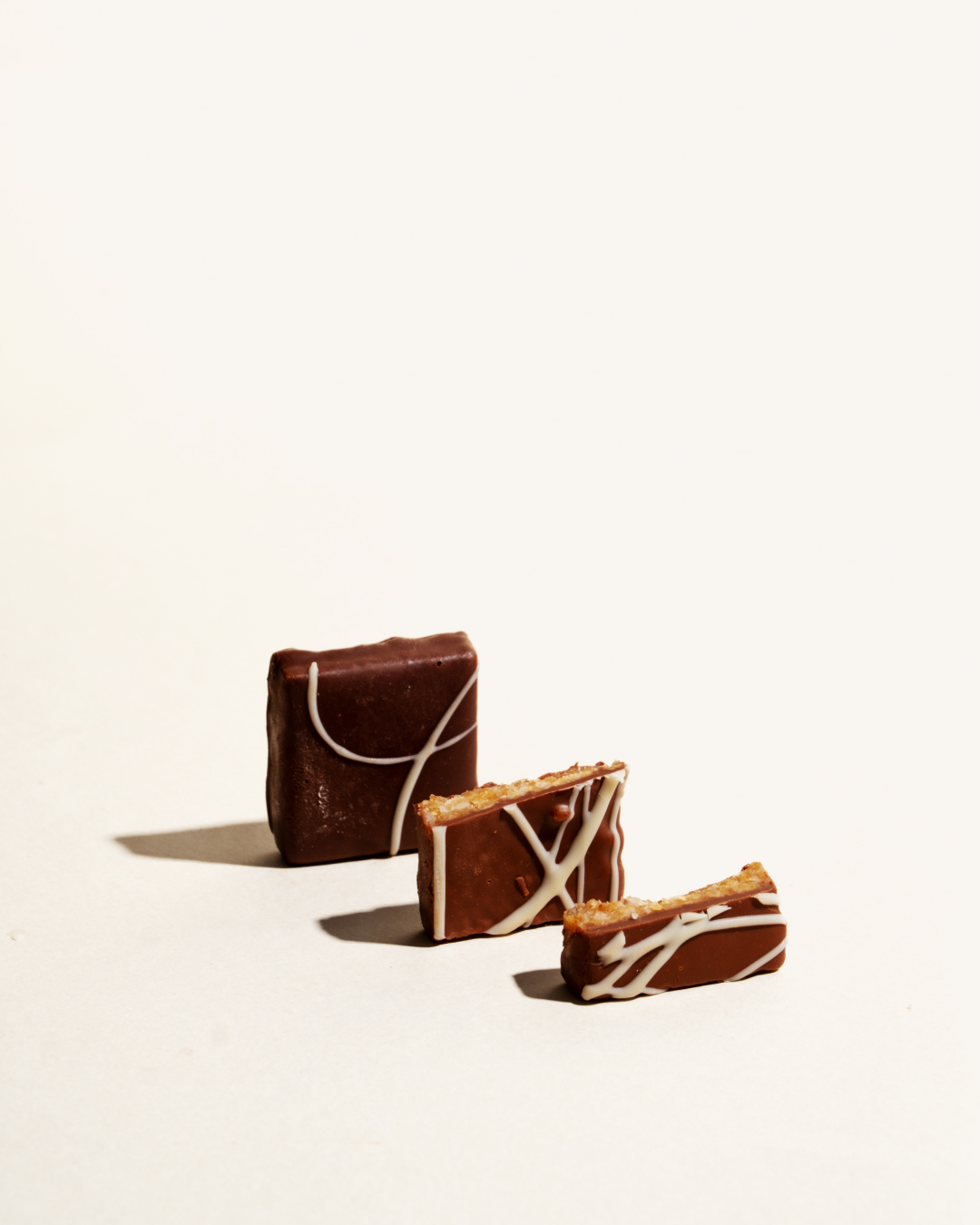 Enrobed Chocolate Coconut Brittles - 45% Milk, 60% Dark & White